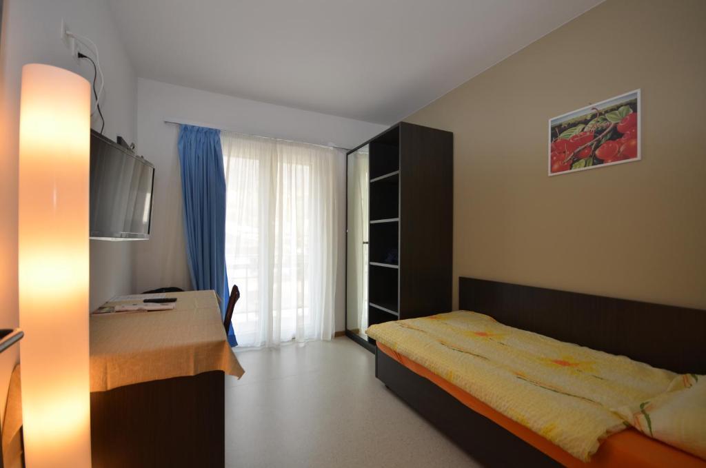 Albergo Elvezia Monteceneri Værelse billede